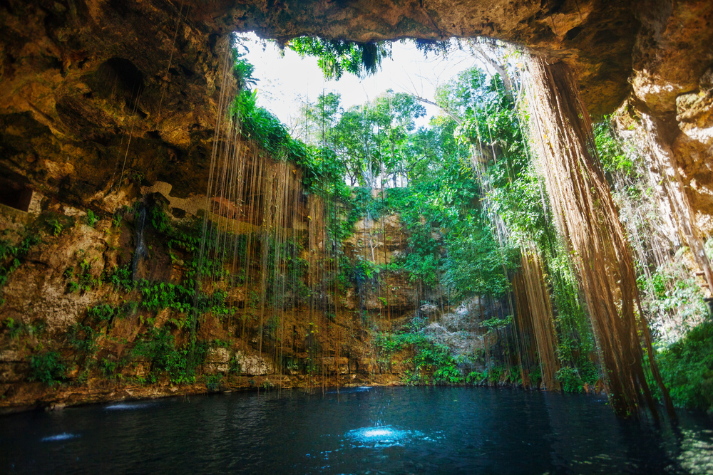 Destinations like Mexico offer travelers the luxury of an all-included resort, plus activities like Ik Kil cenote.